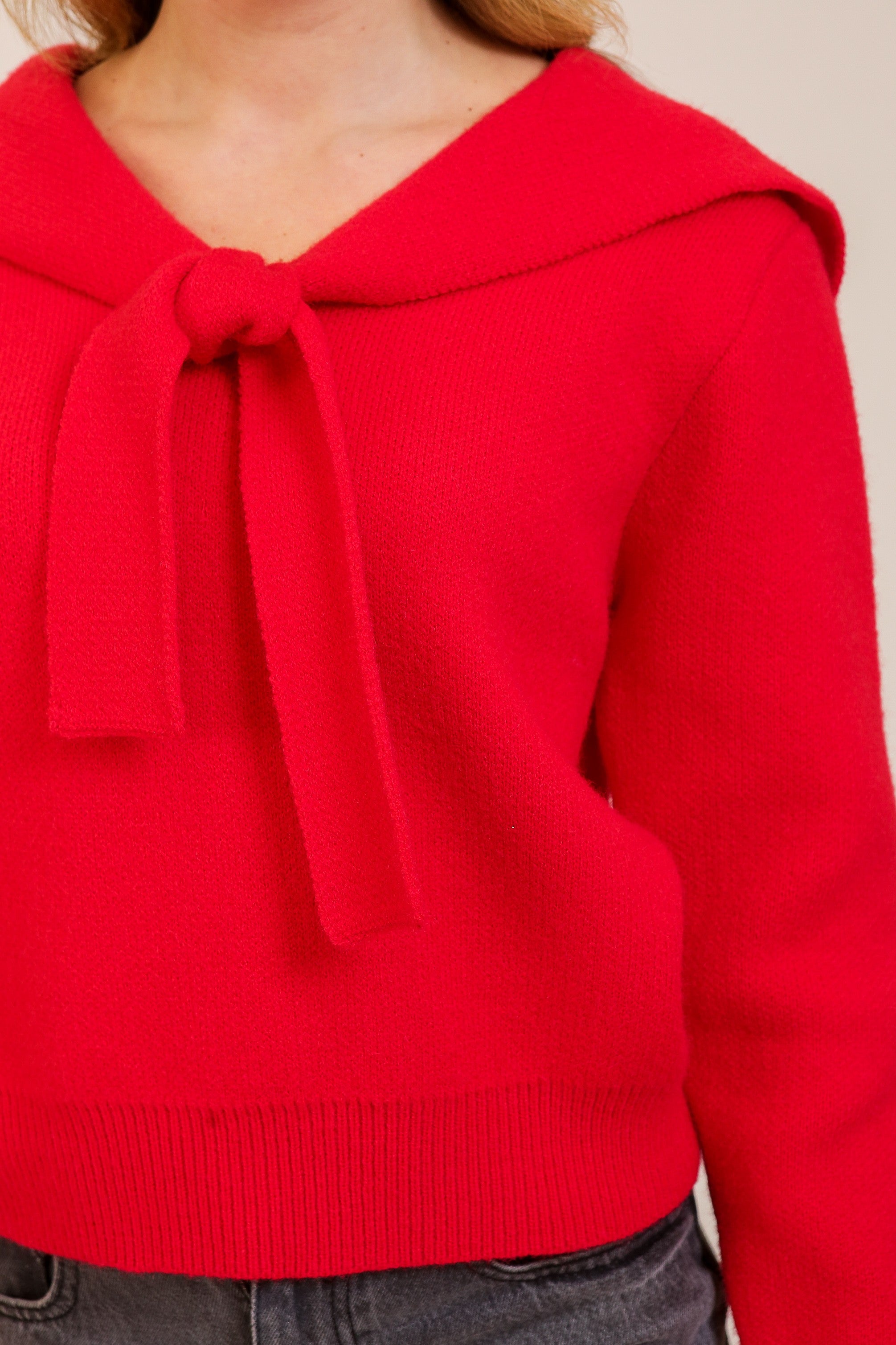 red necktie sweater