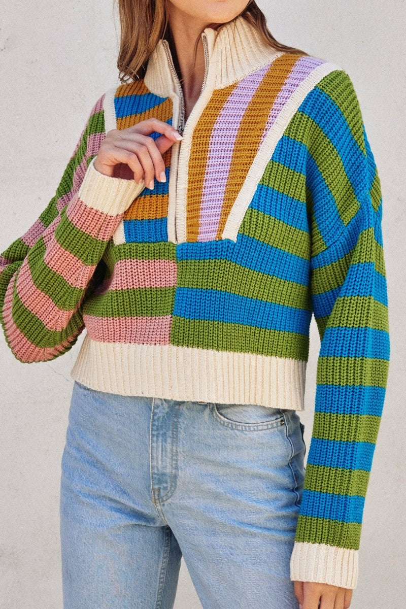 multi-colored half zip sweater